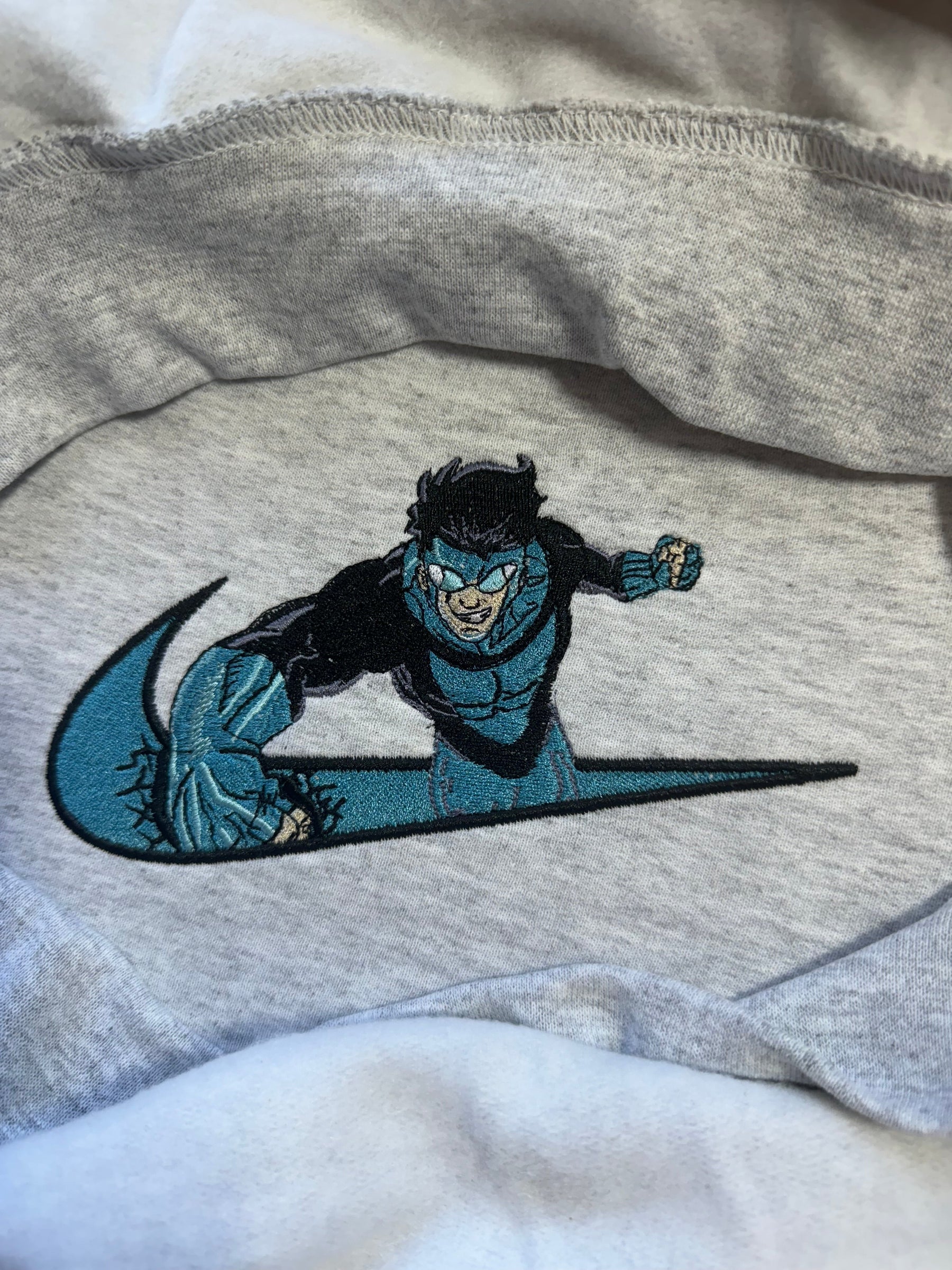 Invincible Blue Suit x Swoosh