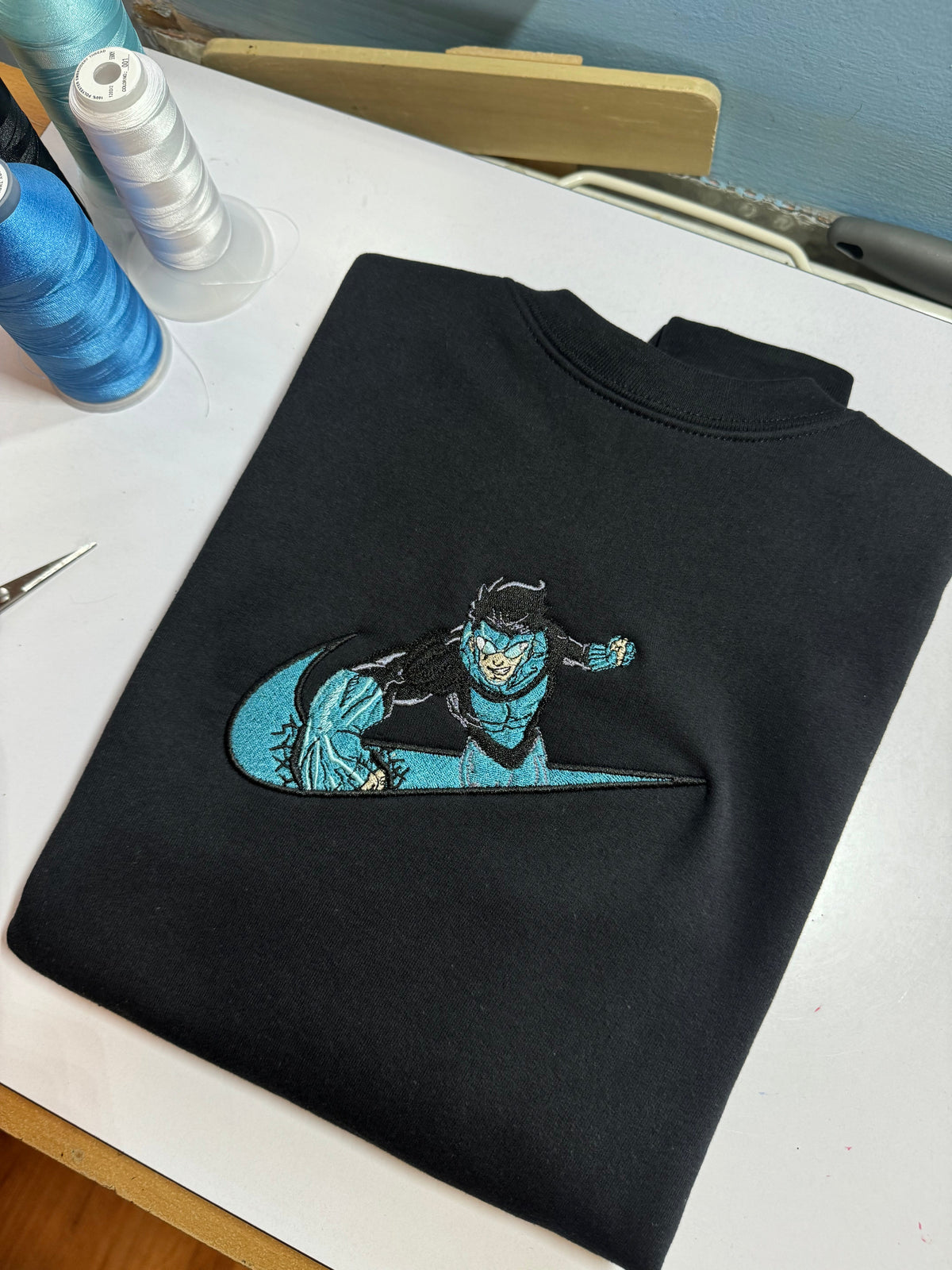 Invincible Blue Suit x Swoosh
